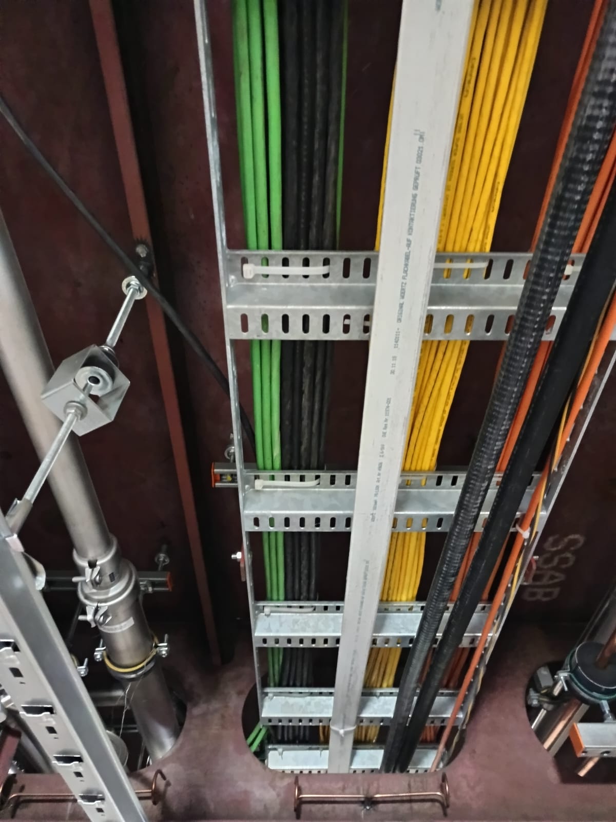 Separated pathways for power and low-voltage services.