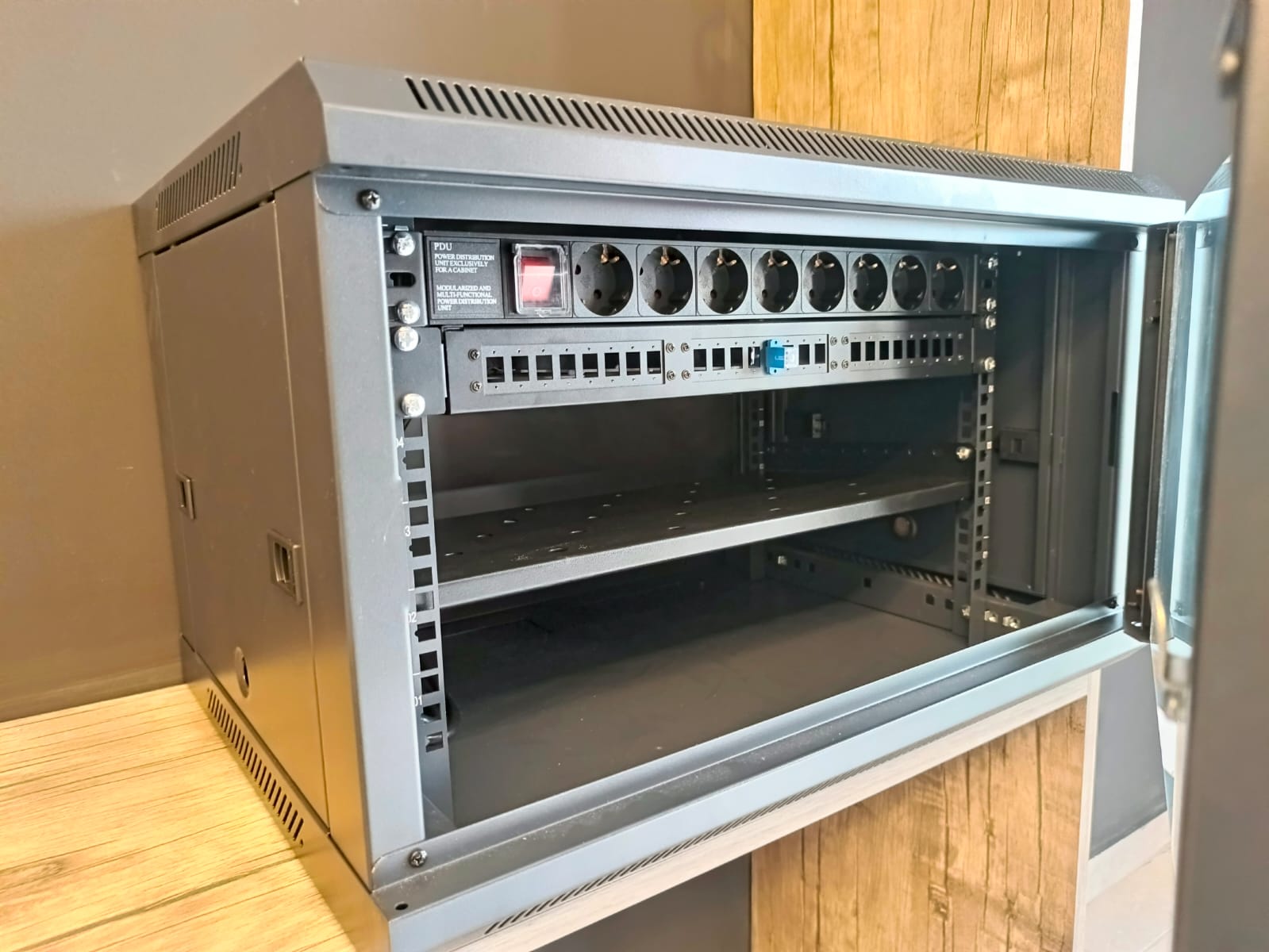 A network enclosure prepared for clean cable termination.