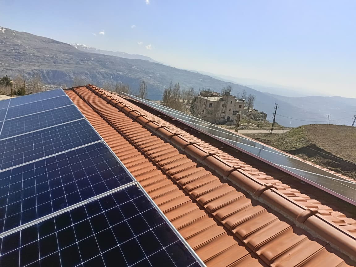 Installed panels integrated into a tiled roof.